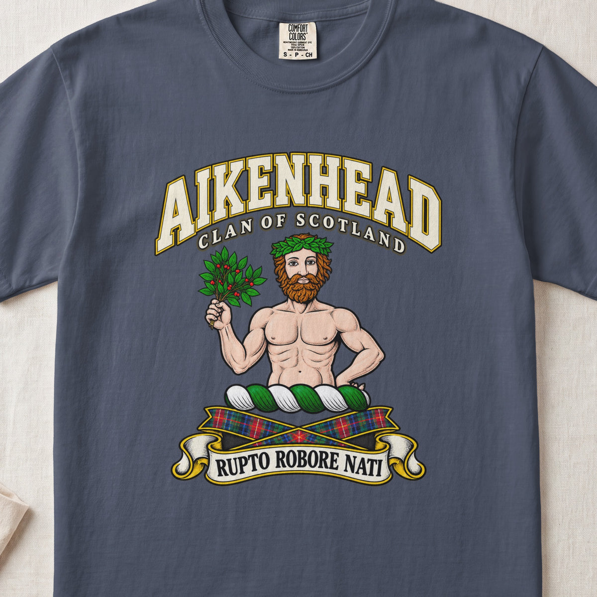 Aikenhead Scottish clan T-shirt in Midnight, front view with a bearded figure holding a leafy branch and motto banner.