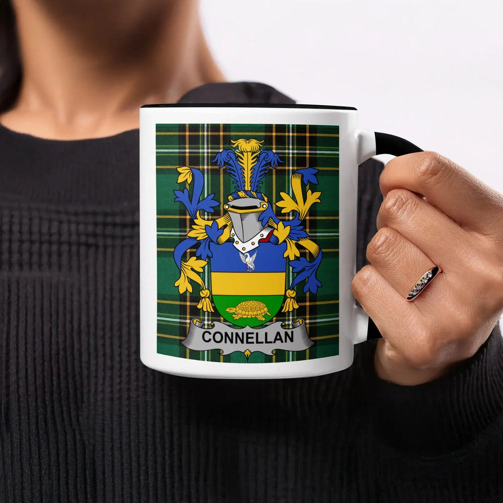Mug with Connellan coat of arms on a green, yellow, and blue plaid background.