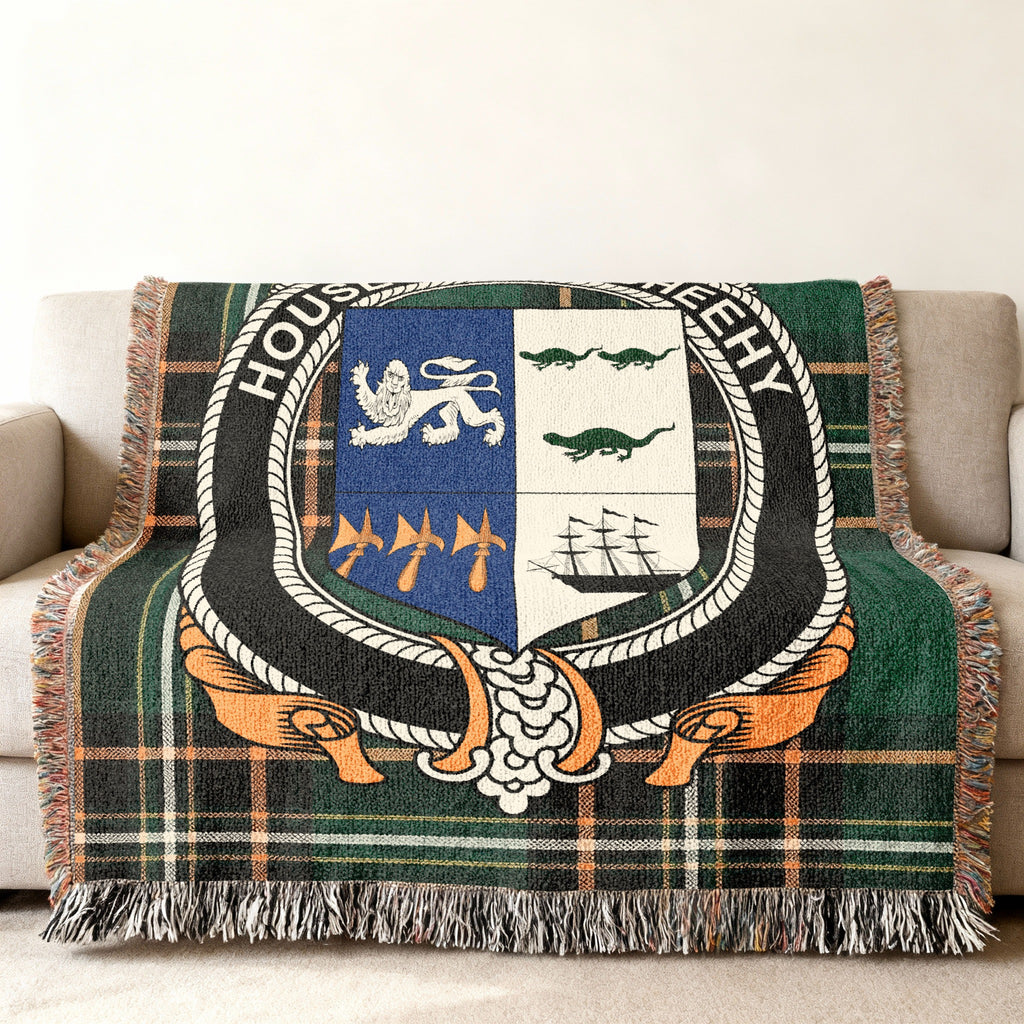 MacSheehy Irish National Tartan woven blanket displayed on a sofa