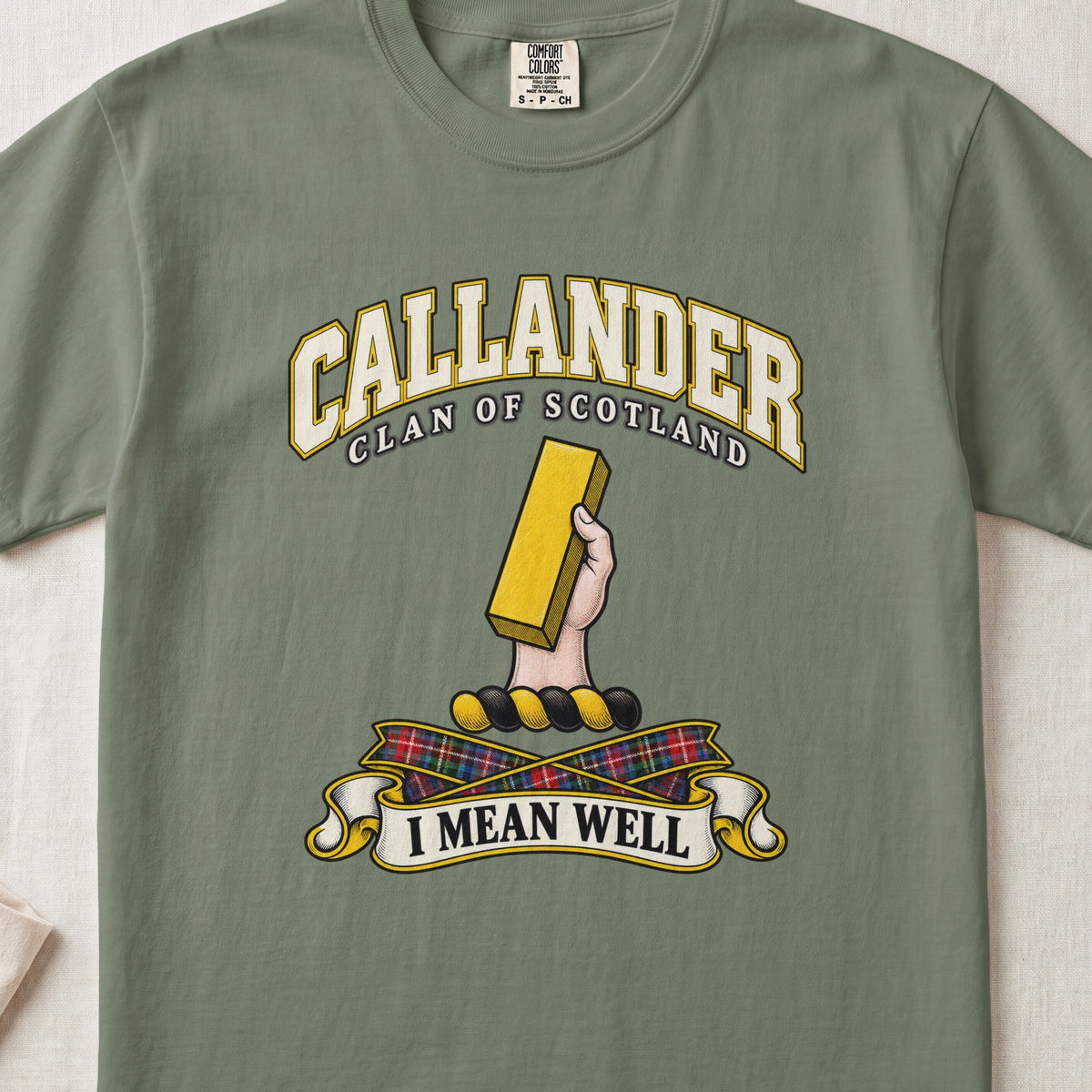 Callander Scottish clan T-shirt in Moss, front view with a hand holding a gold rectangular bar and motto design.