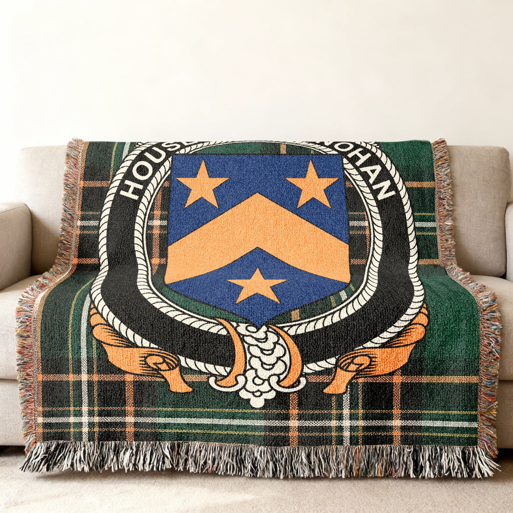 O'Monohan Irish National Tartan woven blanket displayed on a sofa