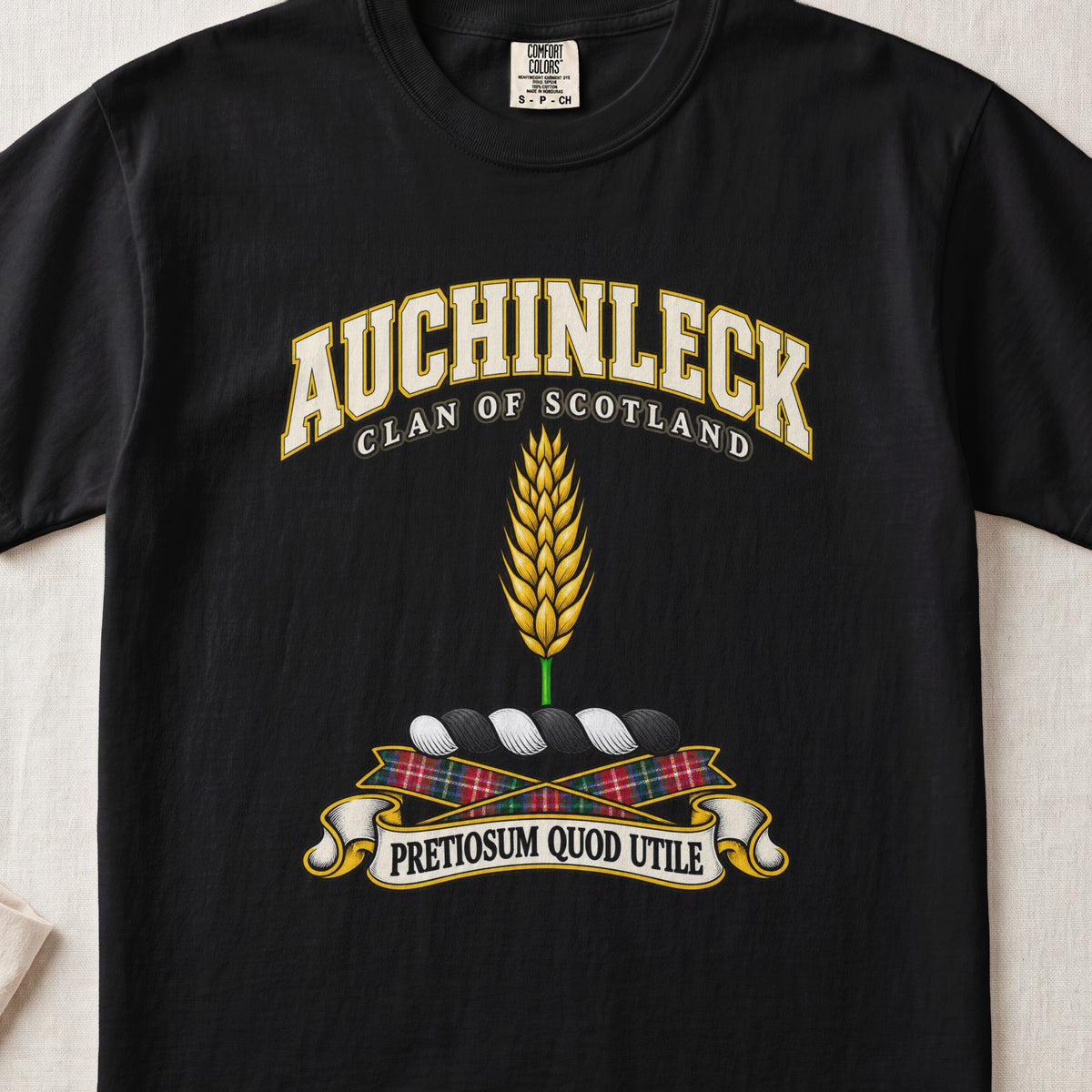 Auchinleck Scottish clan T-shirt in Black, front view with a golden ear of wheat and motto banner.