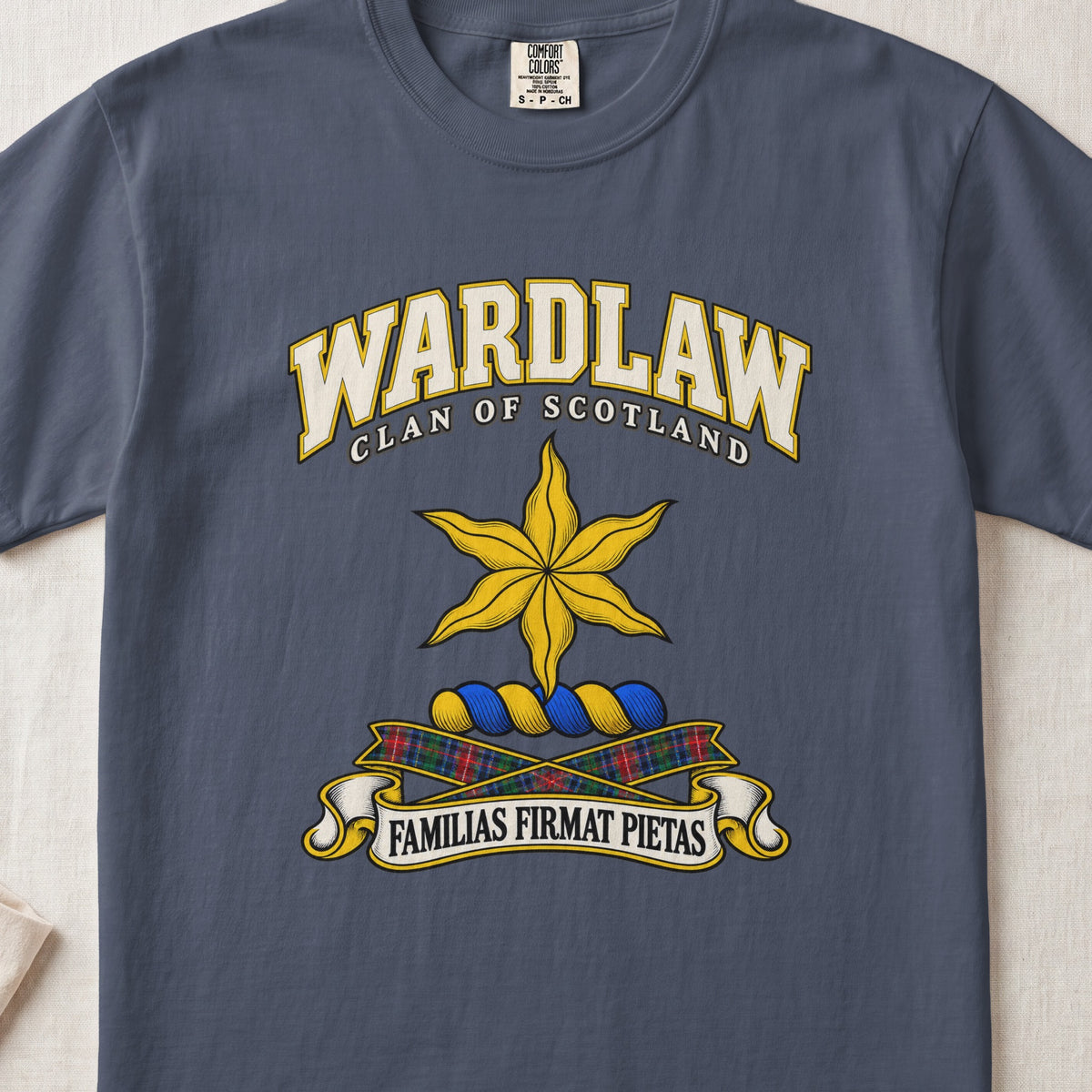 Wardlaw Scottish clan T-shirt in Midnight, front view with a golden star with wavy points and motto design.