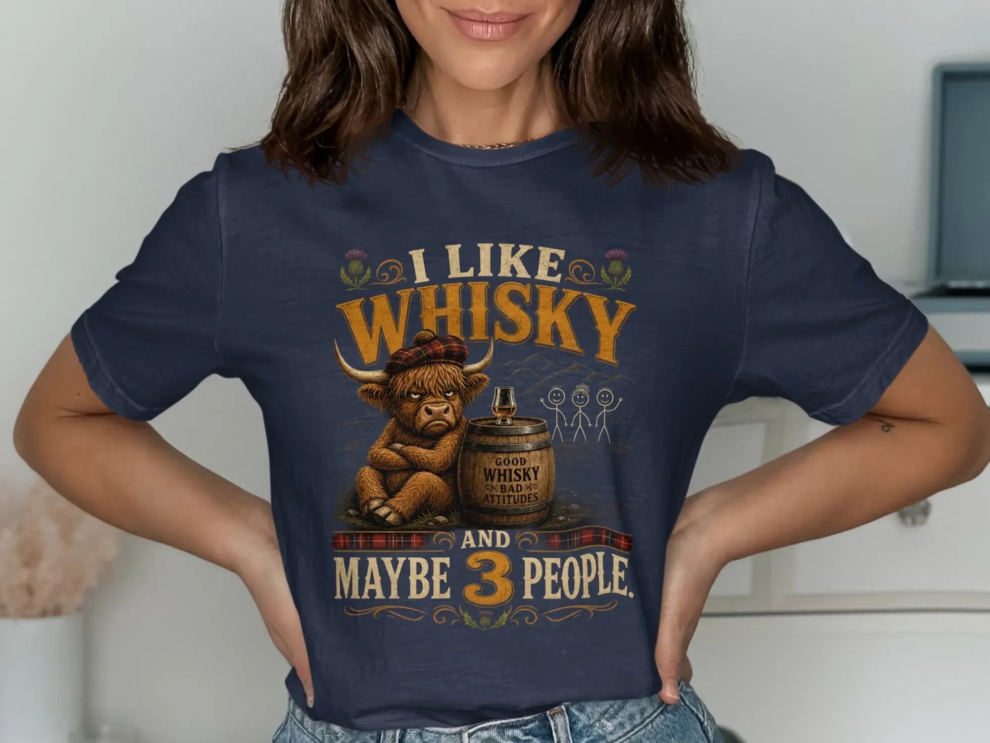 Navy t-shirt with graphic of a Highland cow and whisky glasses, reading "I like whisky and maybe 3 people."