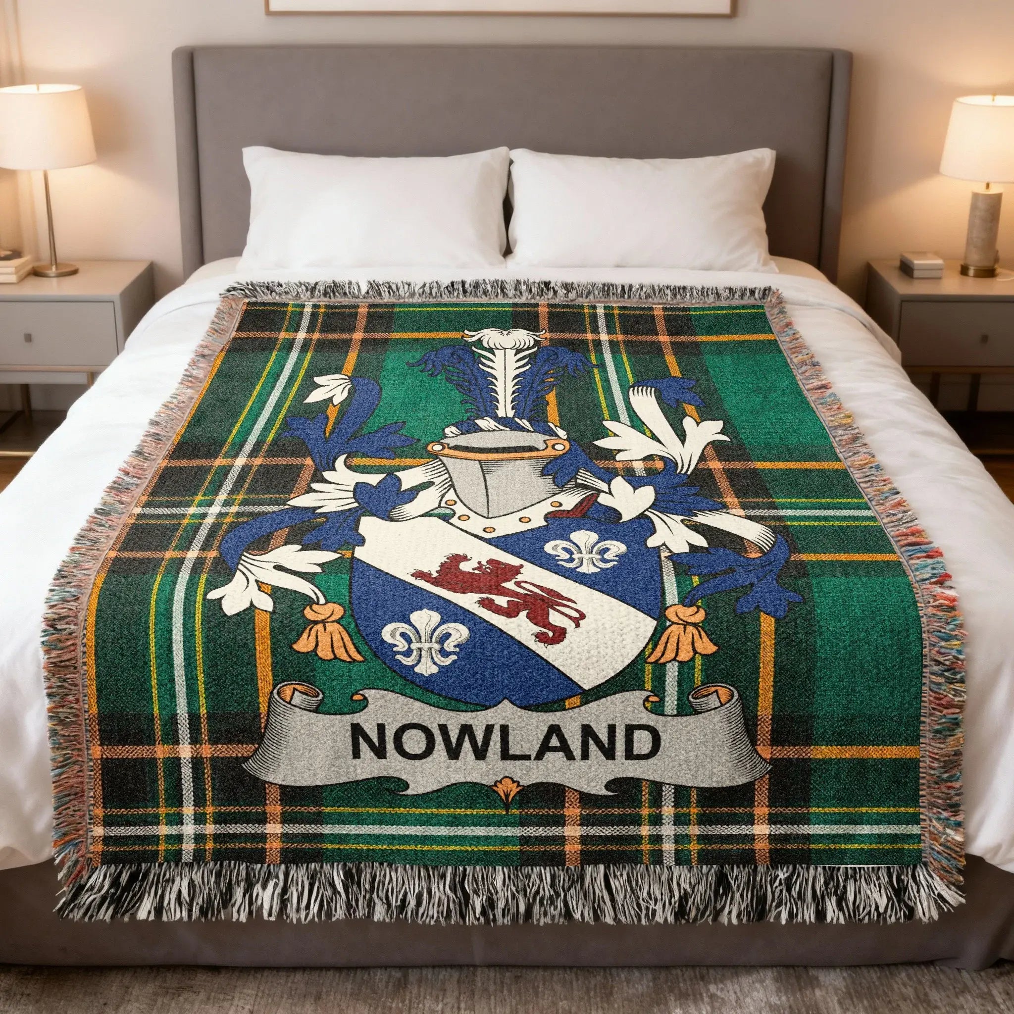 Green tartan blanket with the "Nowland" coat of arms centered.