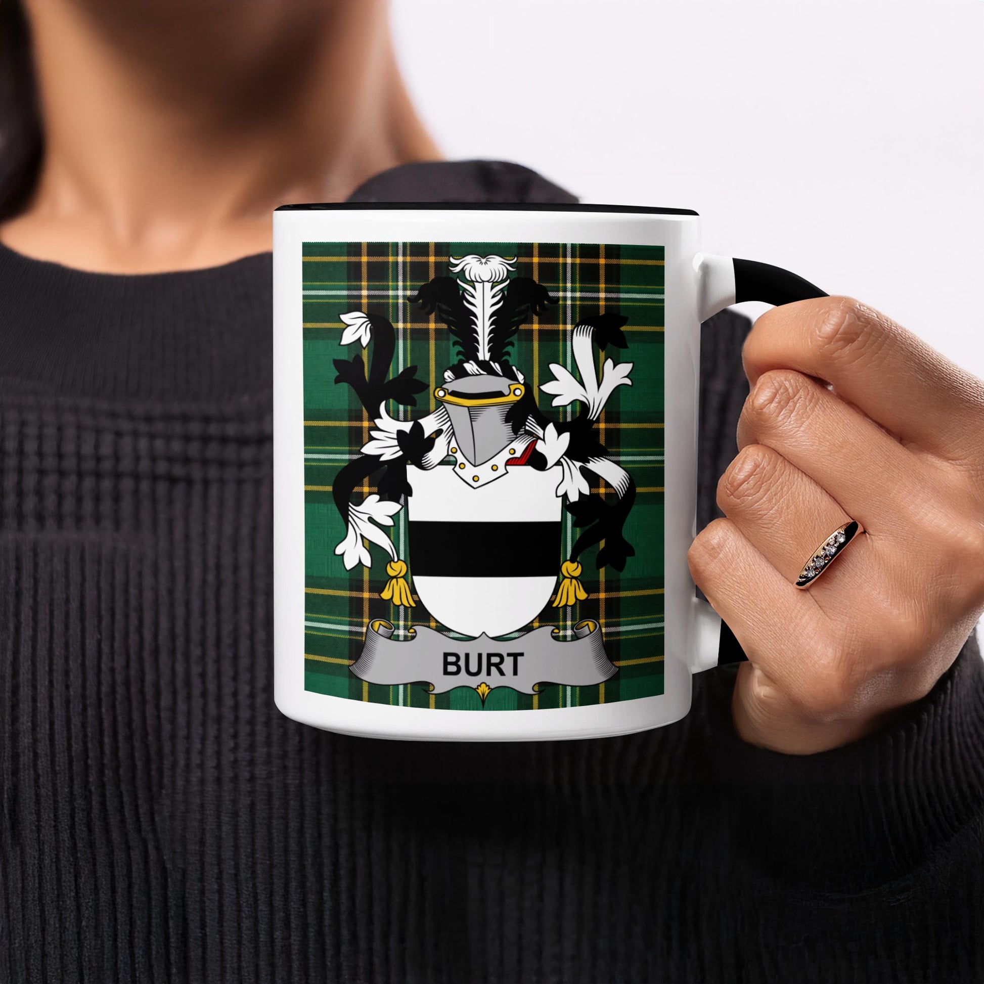 Mug with the Burt family crest on a tartan background.