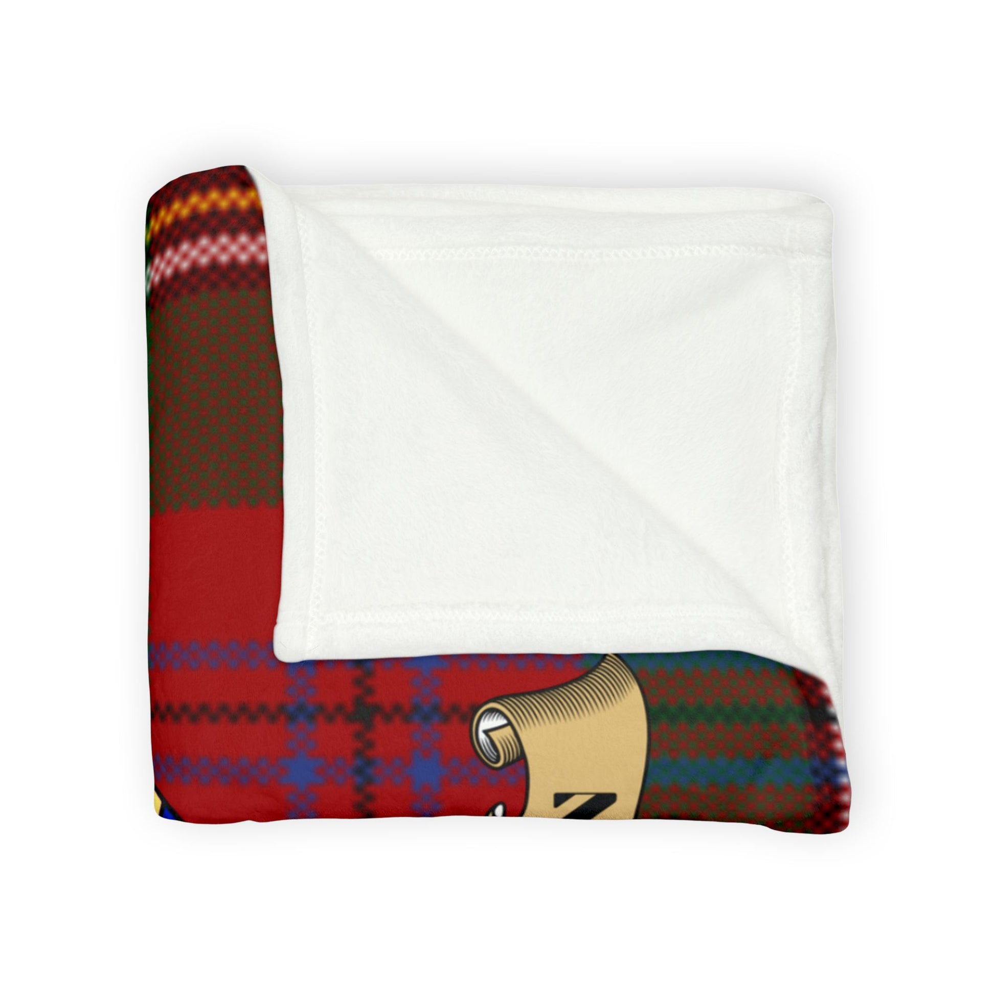 Red tartan blanket with blue and yellow accents folded neatly.