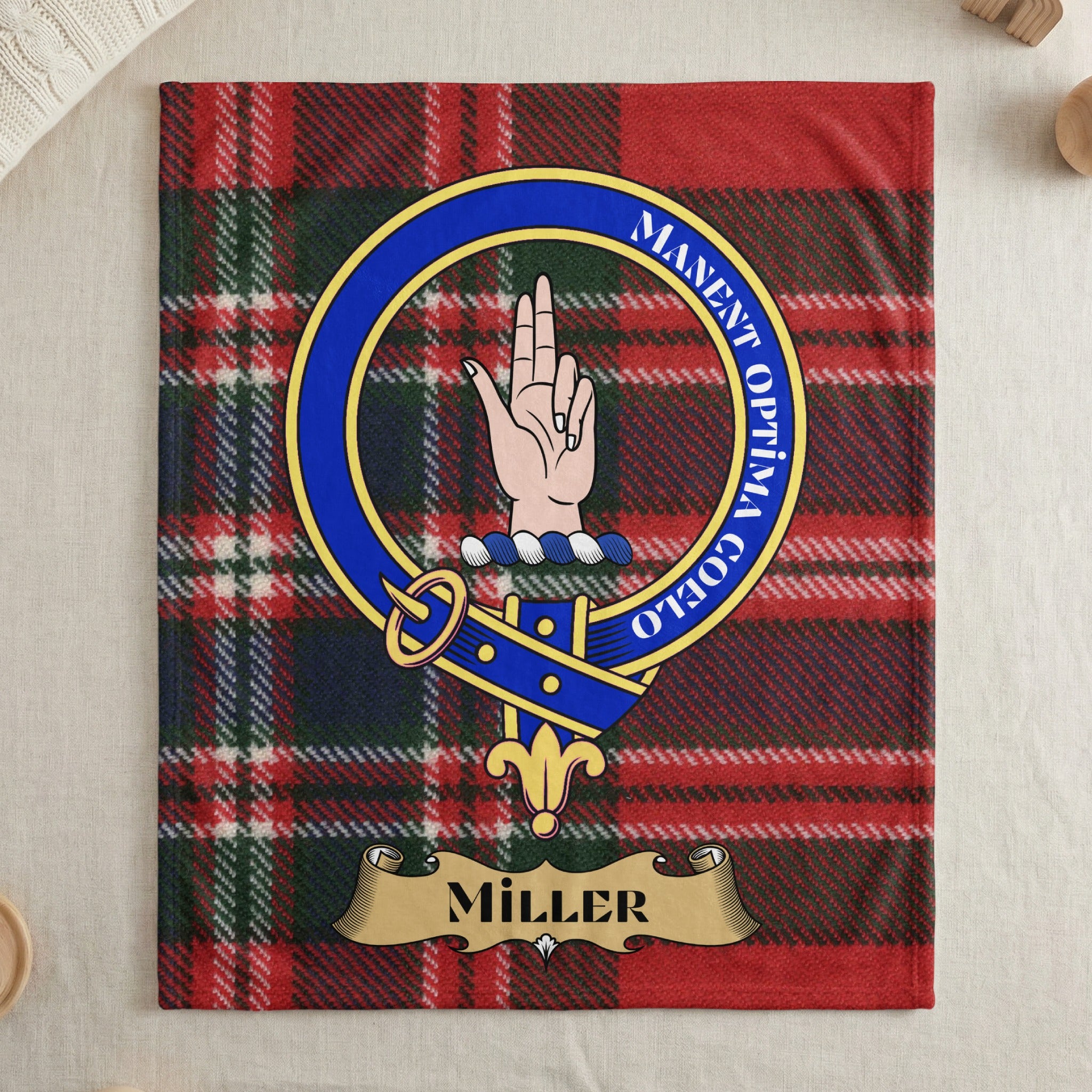 Miller name scroll and crest on tartan throw blanket — draped display