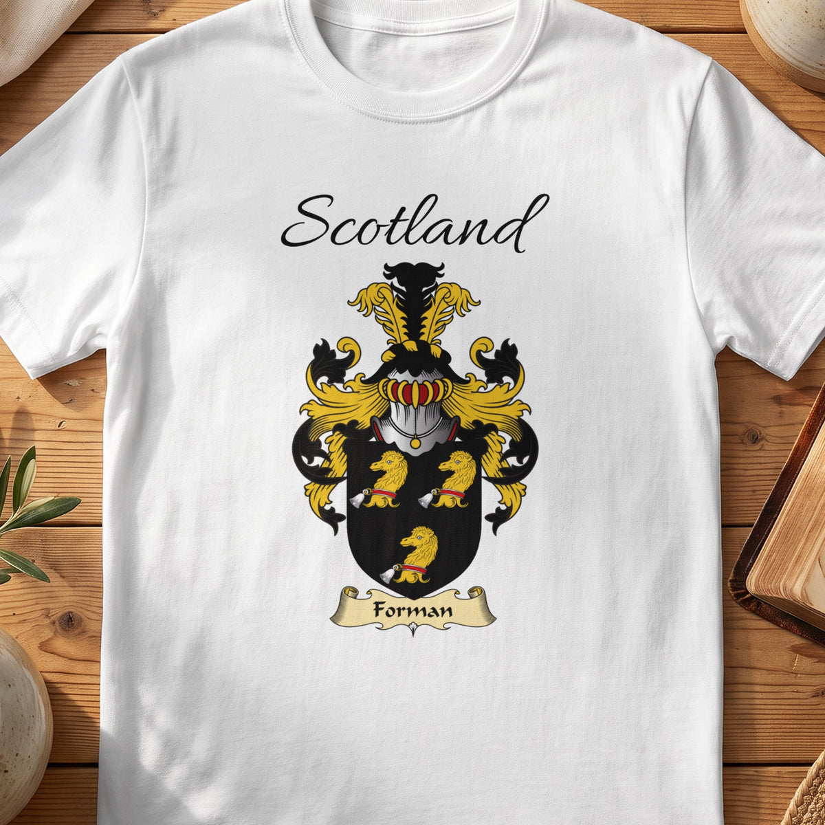 White Forman Scottish family shield T-shirt featuring three gold animal heads on black