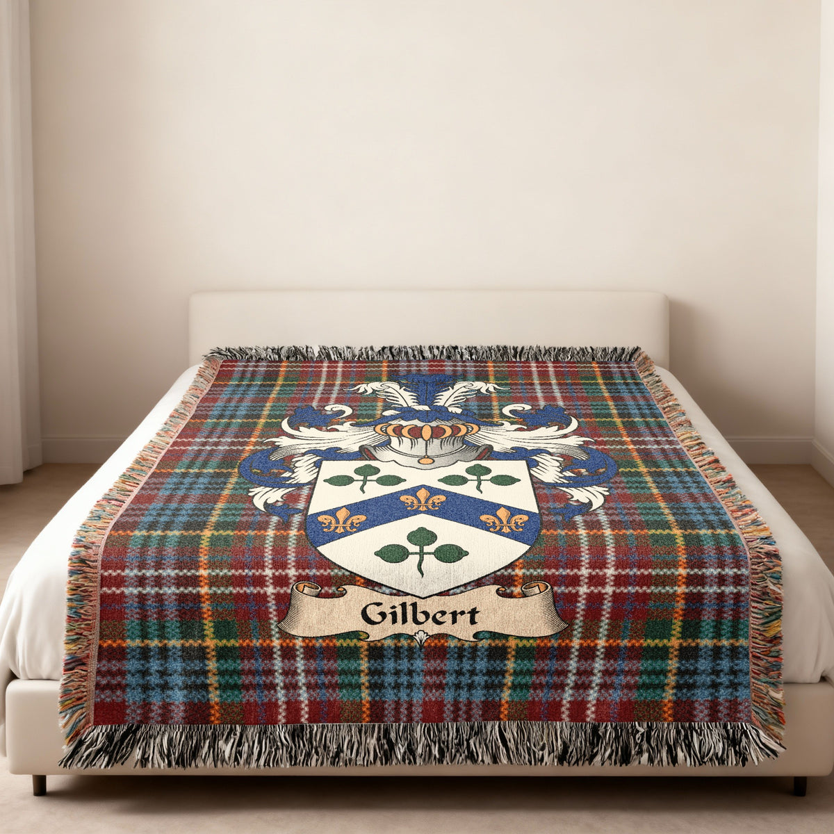 Gilbert Scottish family shield woven blanket on a Caledonia tartan background