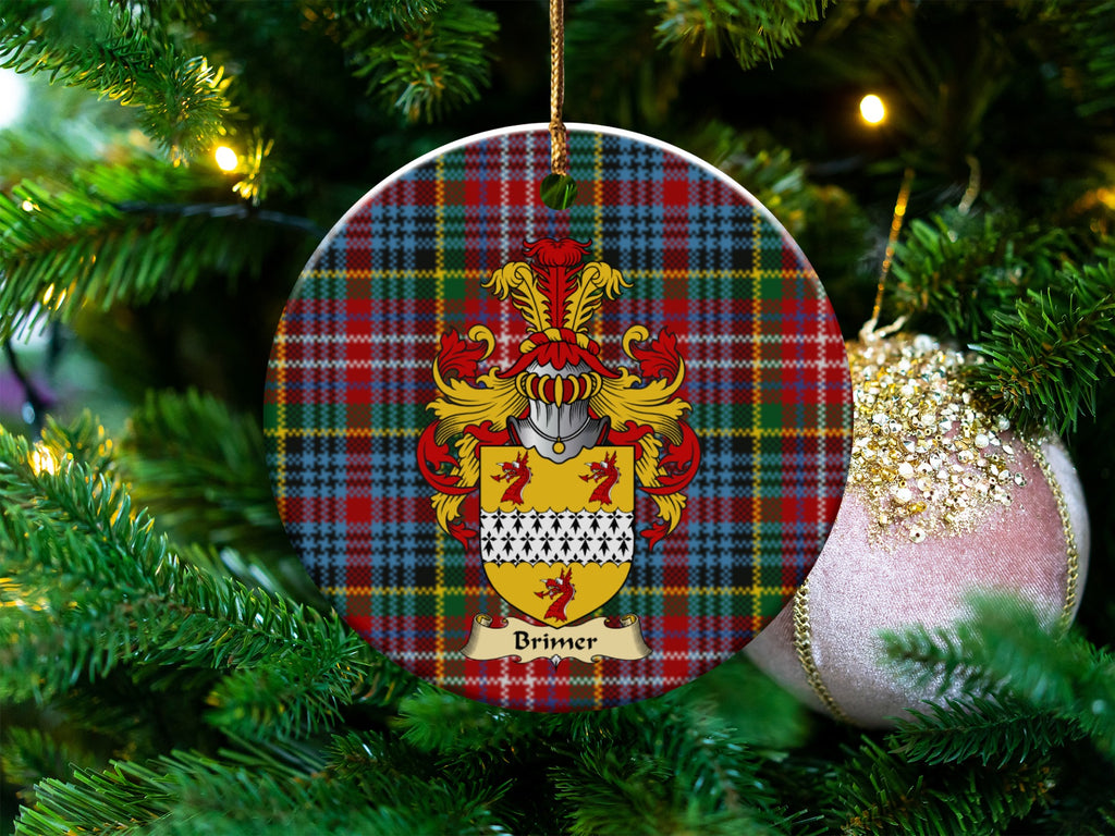Brimer Scottish clan ceramic ornament with family crest on a Caledonia tartan background, hanging on a Christmas tree