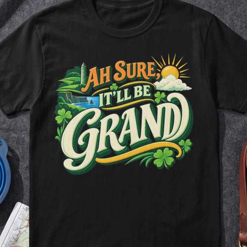 Ah Sure It'll Be Grand Irish graphic T-shirt in Black, flat-lay mockup
