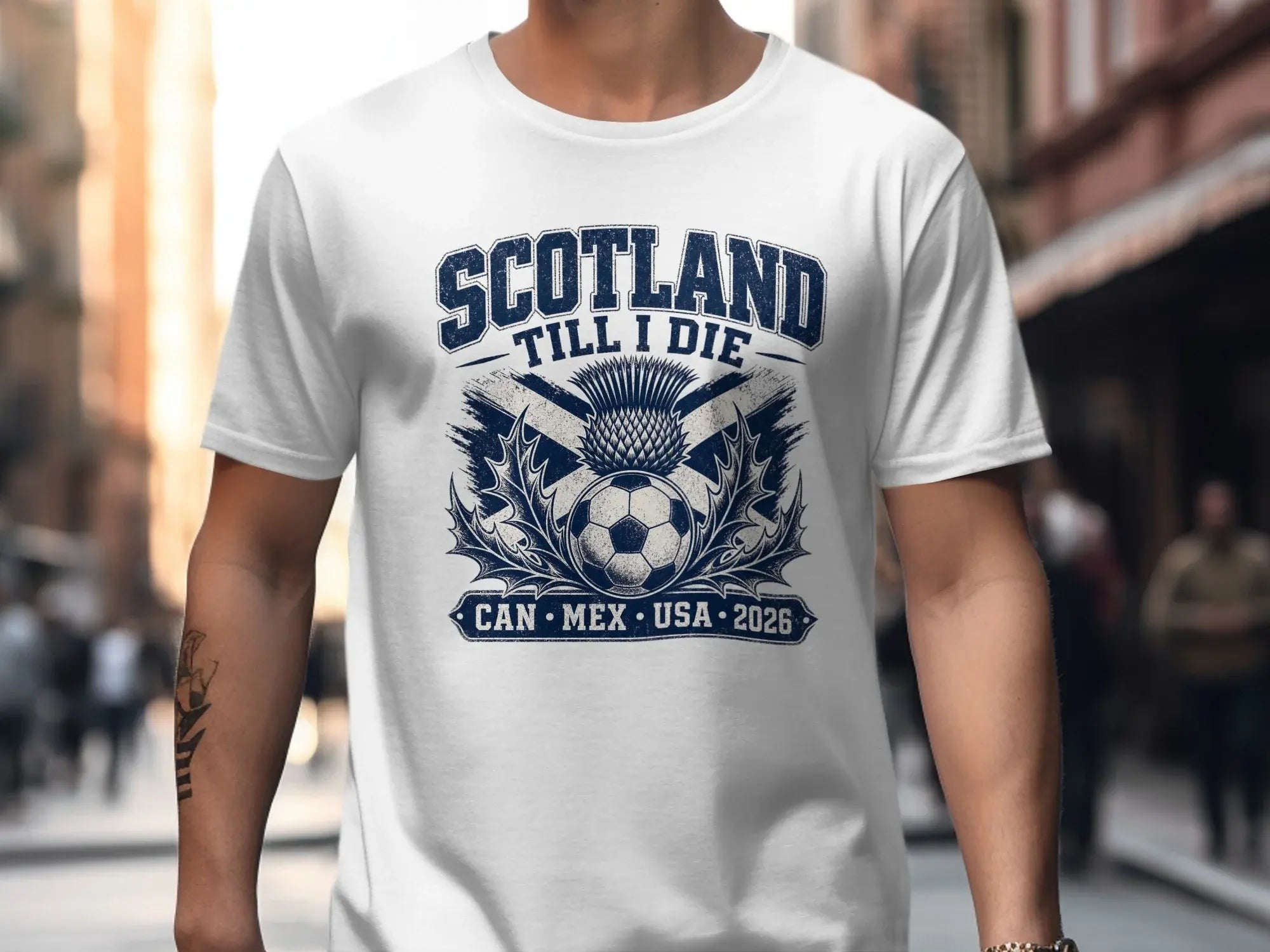White t-shirt with Scotland, soccer ball, and thistle graphic.