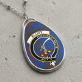 Elliot clan Scottish tartan necklace with clan crest and Fortiter et Recte motto on tartan background