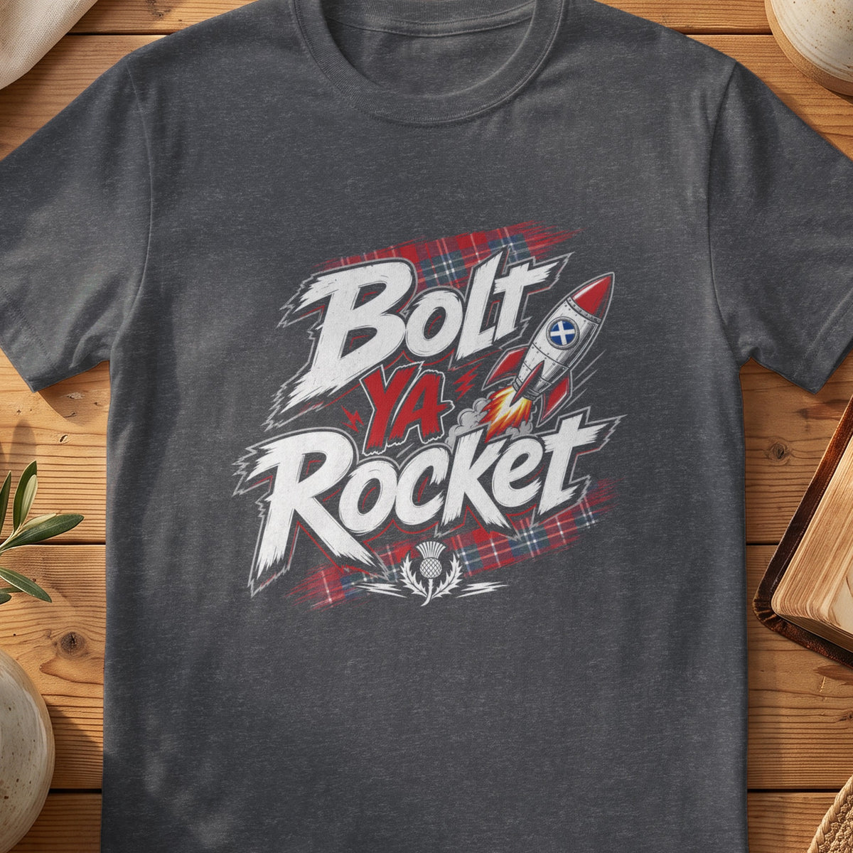 Dark grey Gildan 64000 unisex T-shirt flatlay with Bolt Ya Rocket Scottish graphic design