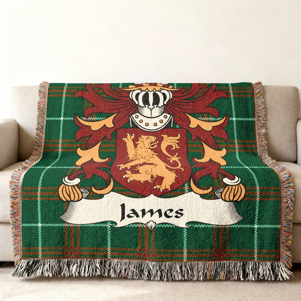 Green plaid throw blanket featuring the James family crest with a lion and crown.