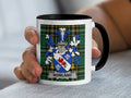 Nowland Irish Heritage Accent Mug with black handle and family crest