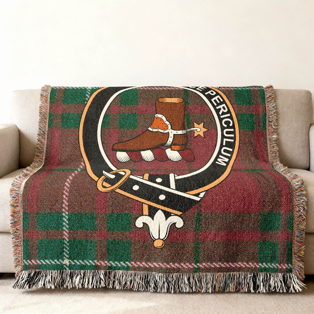 Clan MacAulay tartan woven blanket — fringe border detail showing woven pattern and clan crest
