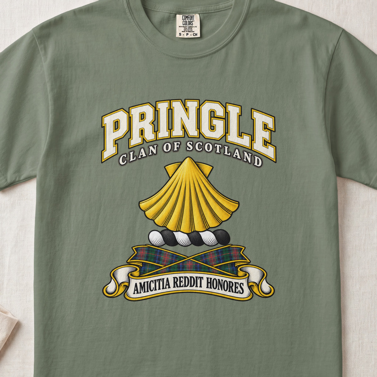 Pringle Scottish clan T-shirt in Moss, front view with a golden scallop shell and motto design.