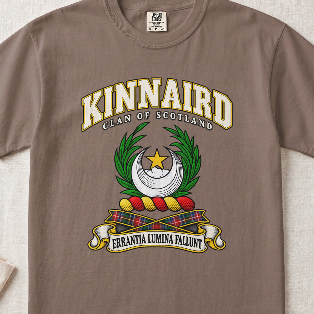 Kinnaird Scottish clan T-shirt in Espresso, front view with a silver crescent, gold star and green leafy branches and motto design.