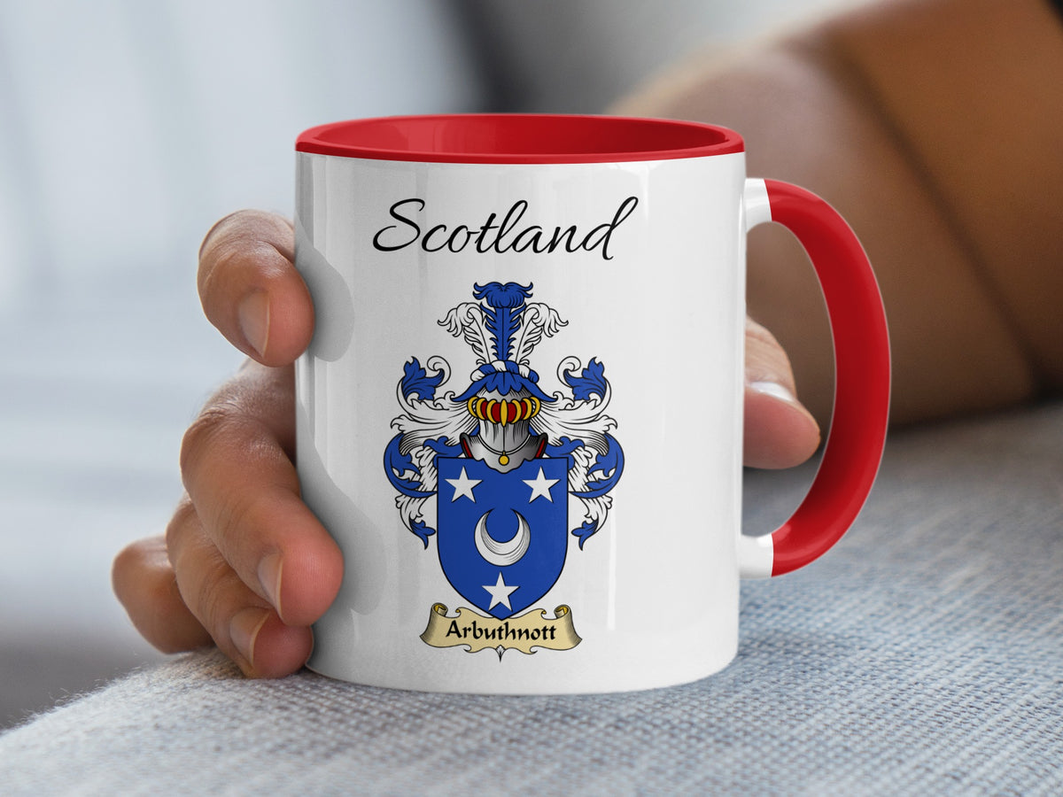 Red-accent Arbuthnott Scottish surname mug with matching handle and interior and coat of arms artwork beneath “Scotland”.