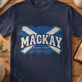 MacKay Scottish Saltire T-shirt in Navy, with distressed blue and cream flag and “Manu Forti” lettering.