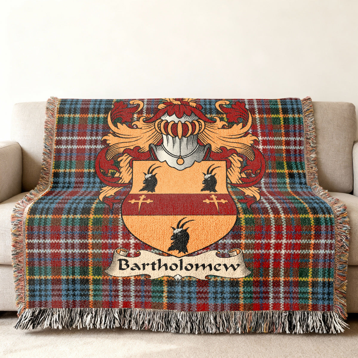 Bartholomew Scottish family shield woven blanket on a Caledonia tartan background