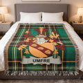 Tartan blanket featuring a coat of arms with "UMFRE" banner.