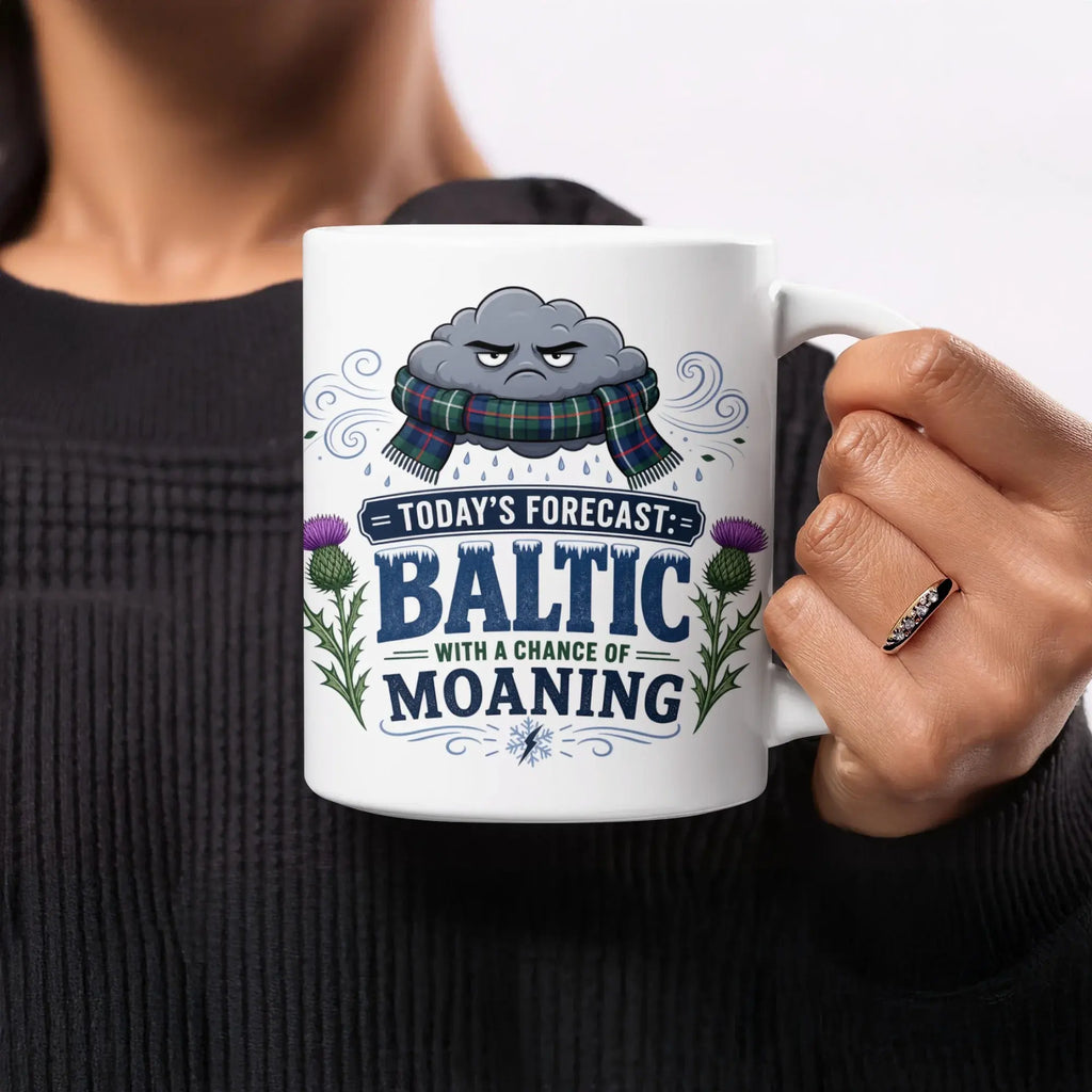 White mug with "Today's Forecast: Baltic with a Chance of Moaning" text.