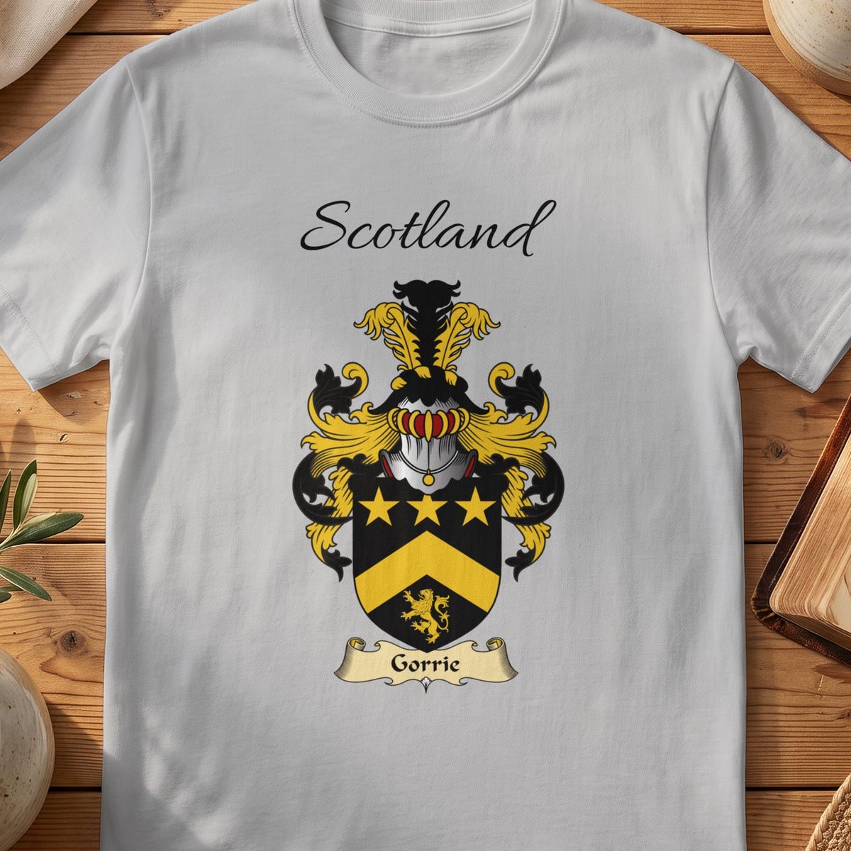Sport Grey Gorrie Scottish family shield T-shirt featuring gold stars and a gold chevron on black