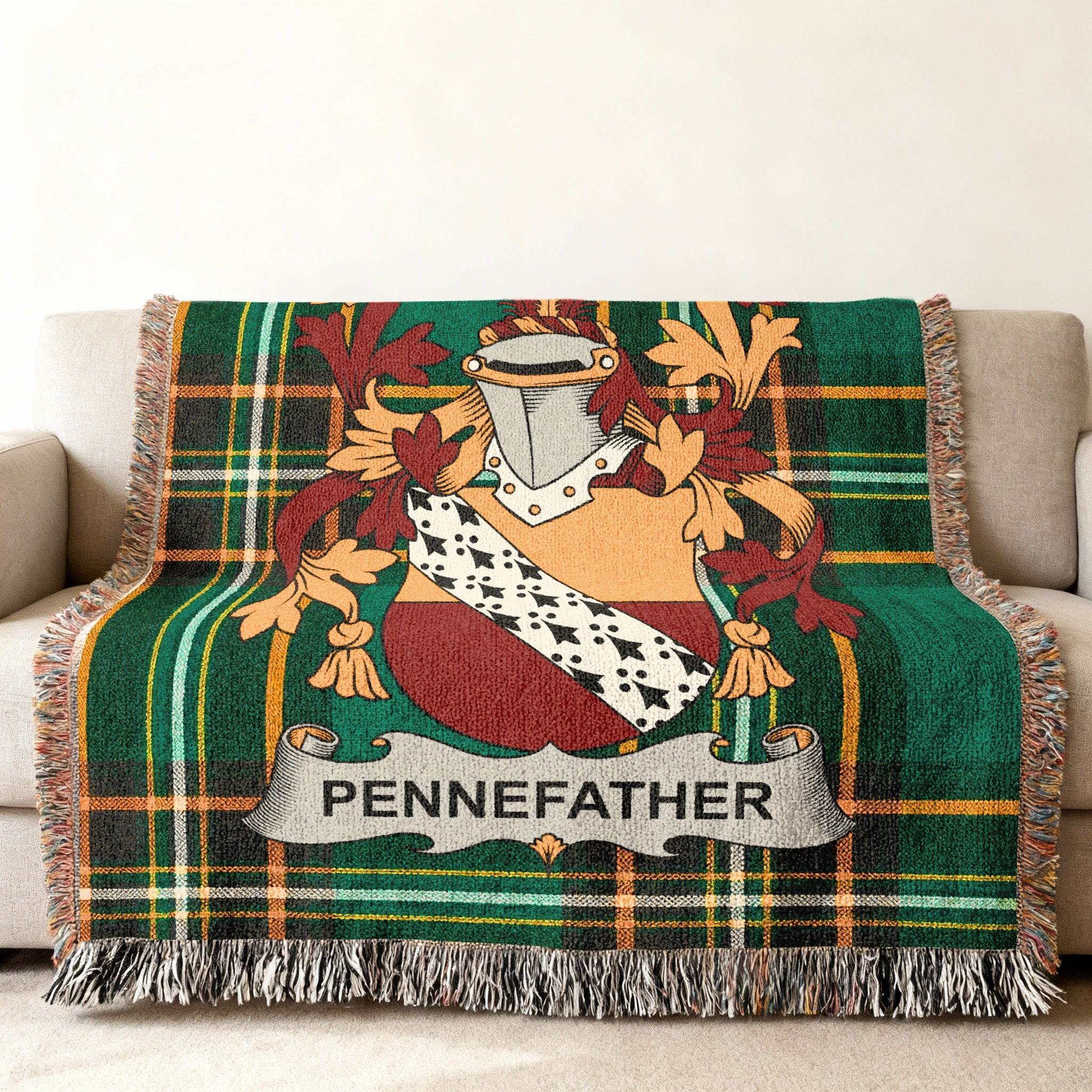 Green plaid woven throw blanket with Pennefather family crest.
