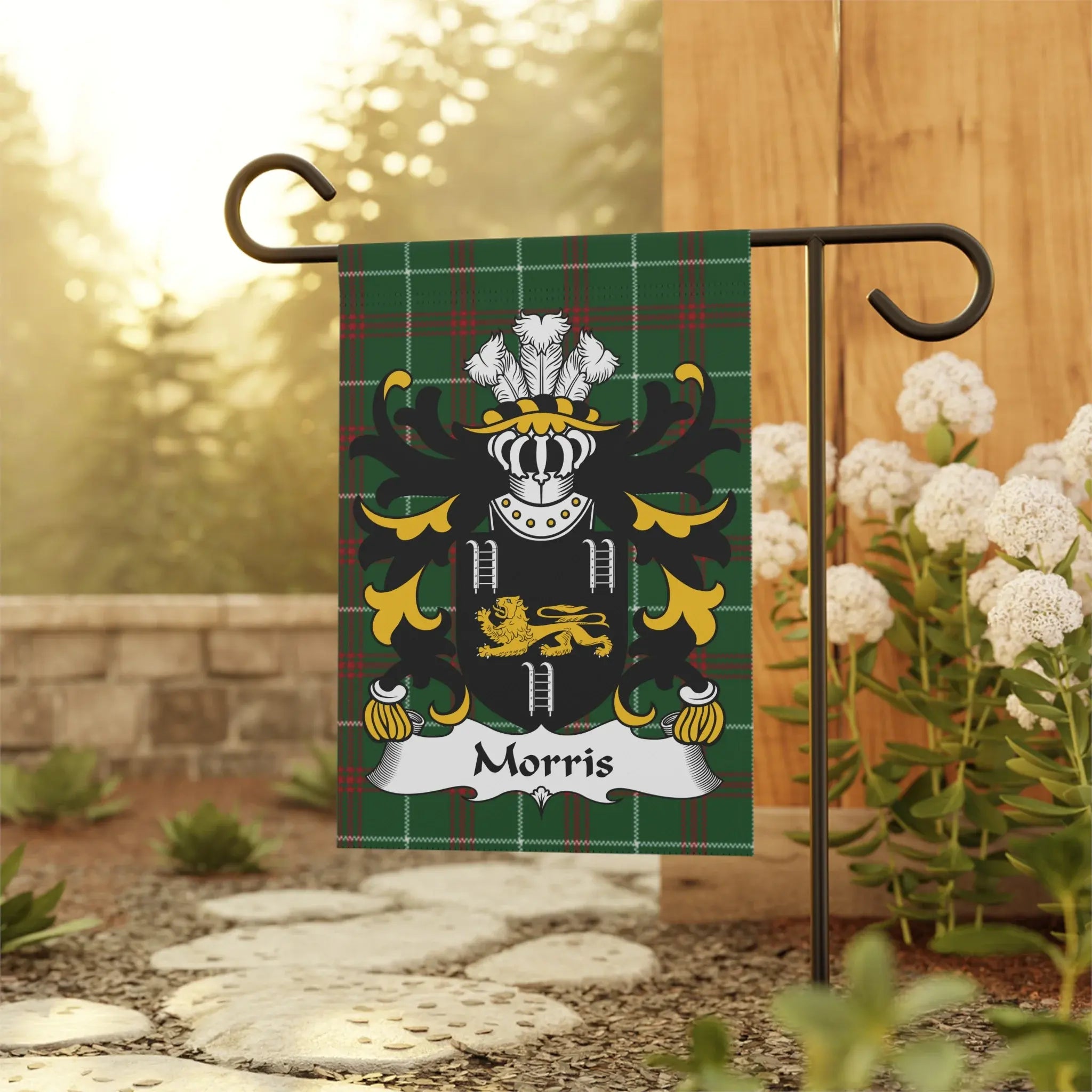 Morris family crest on a green tartan garden flag.