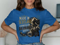 Blue t-shirt with "Made in Scotland" and a Scottish warrior graphic.