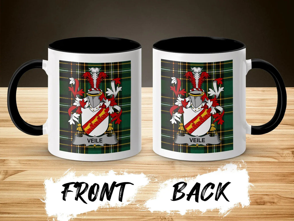 Two ceramic mugs, each displaying a family crest with the name "Veile."