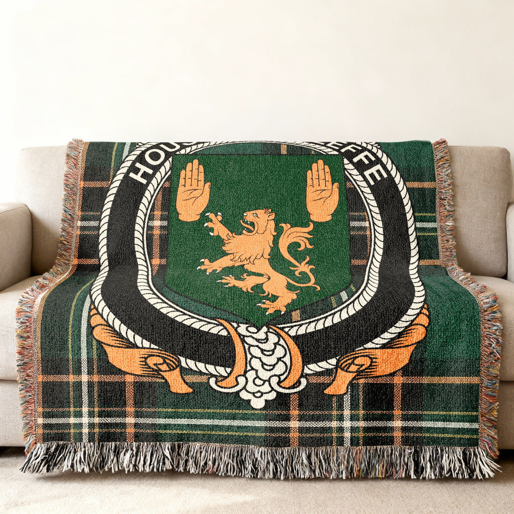 O'Keeffe Irish National Tartan woven blanket displayed on a sofa