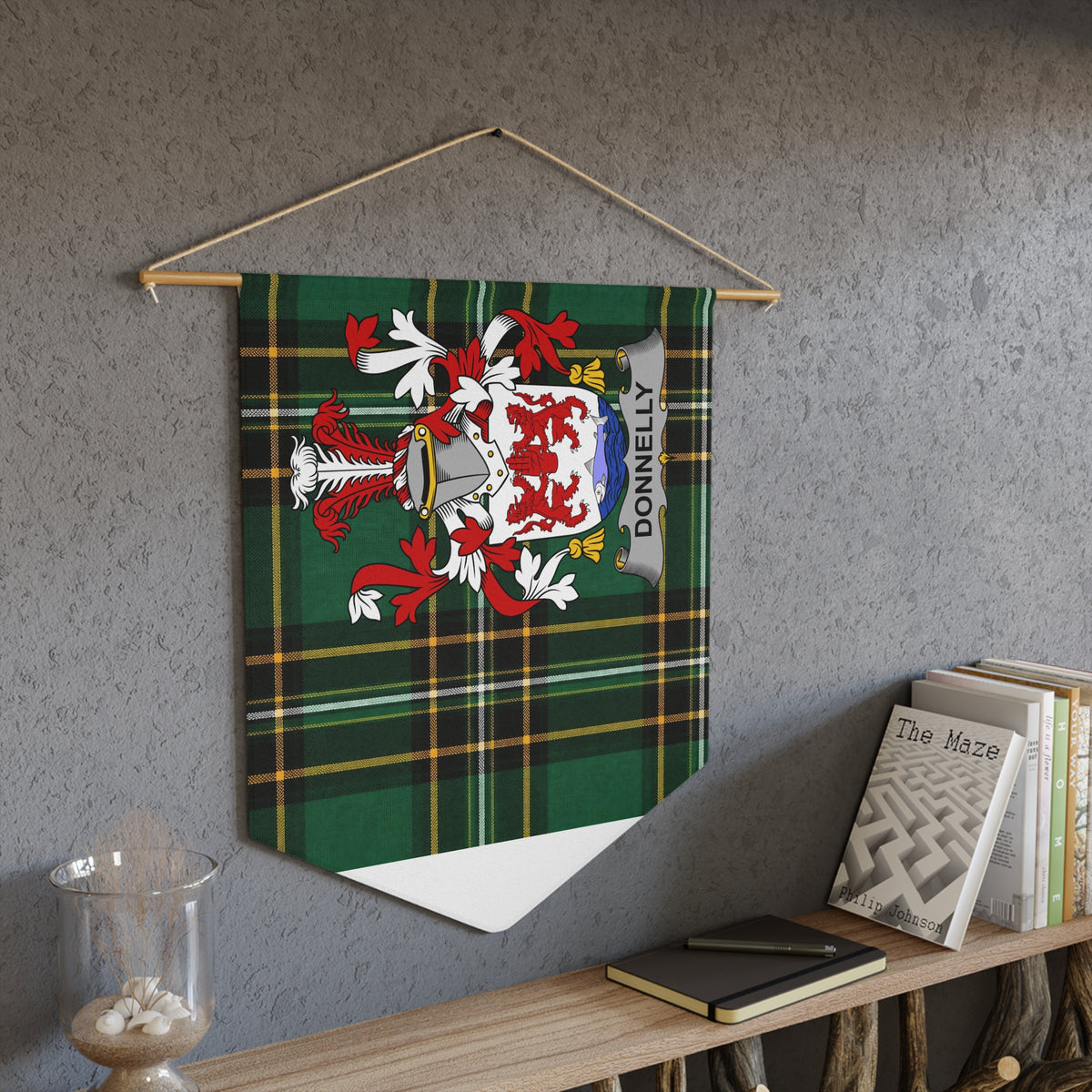 Donnelly family crest on a green plaid pennant hanging on a wall.