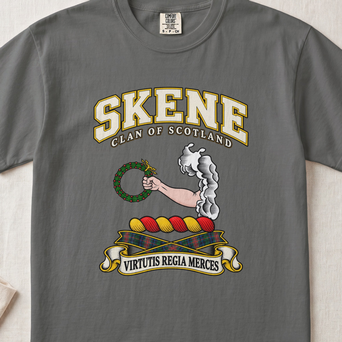 Skene Scottish clan T-shirt in Pepper, front view with an arm extending from clouds and holding a green wreath and motto design.
