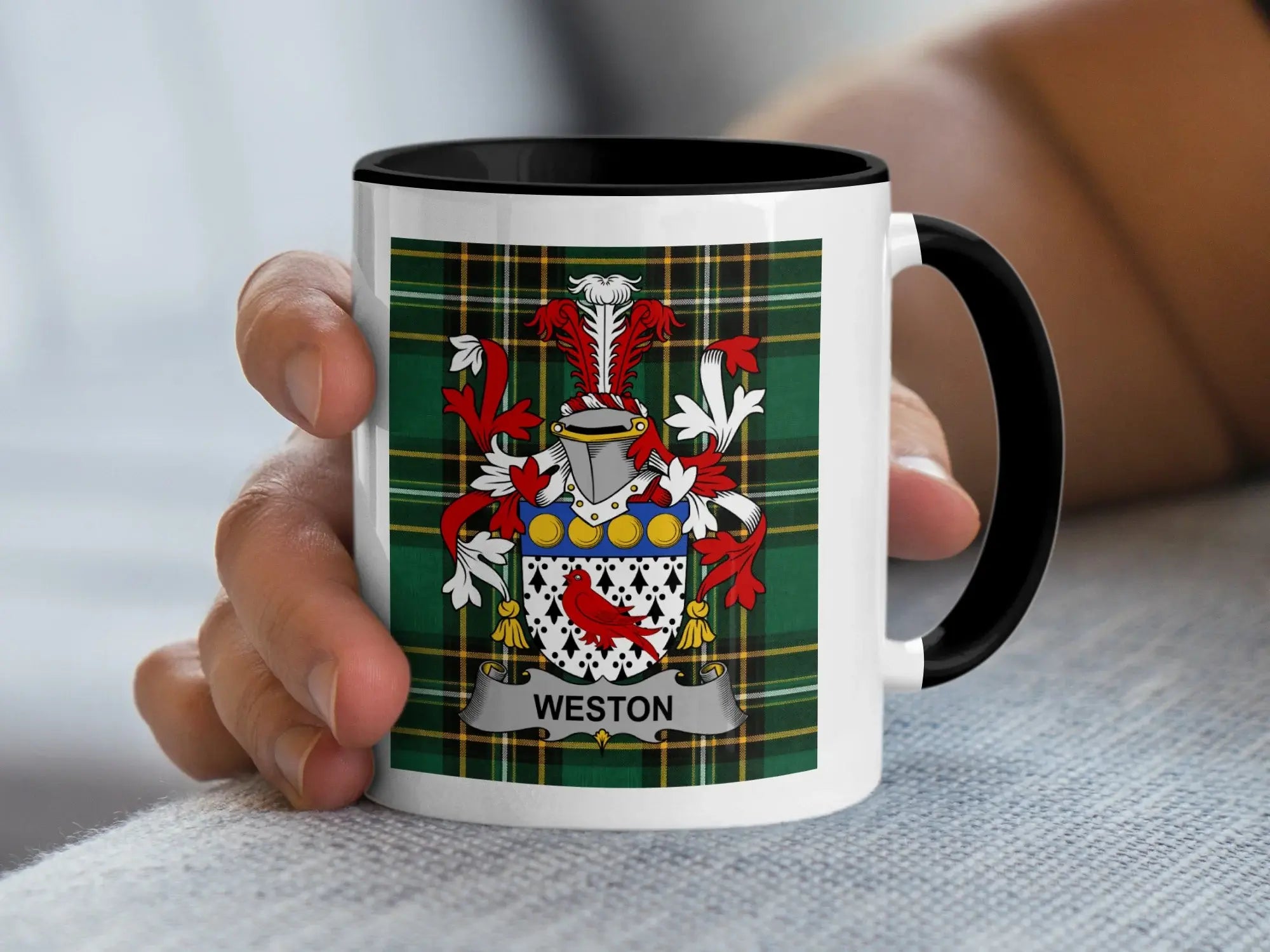 Mug with Weston family crest on plaid background.