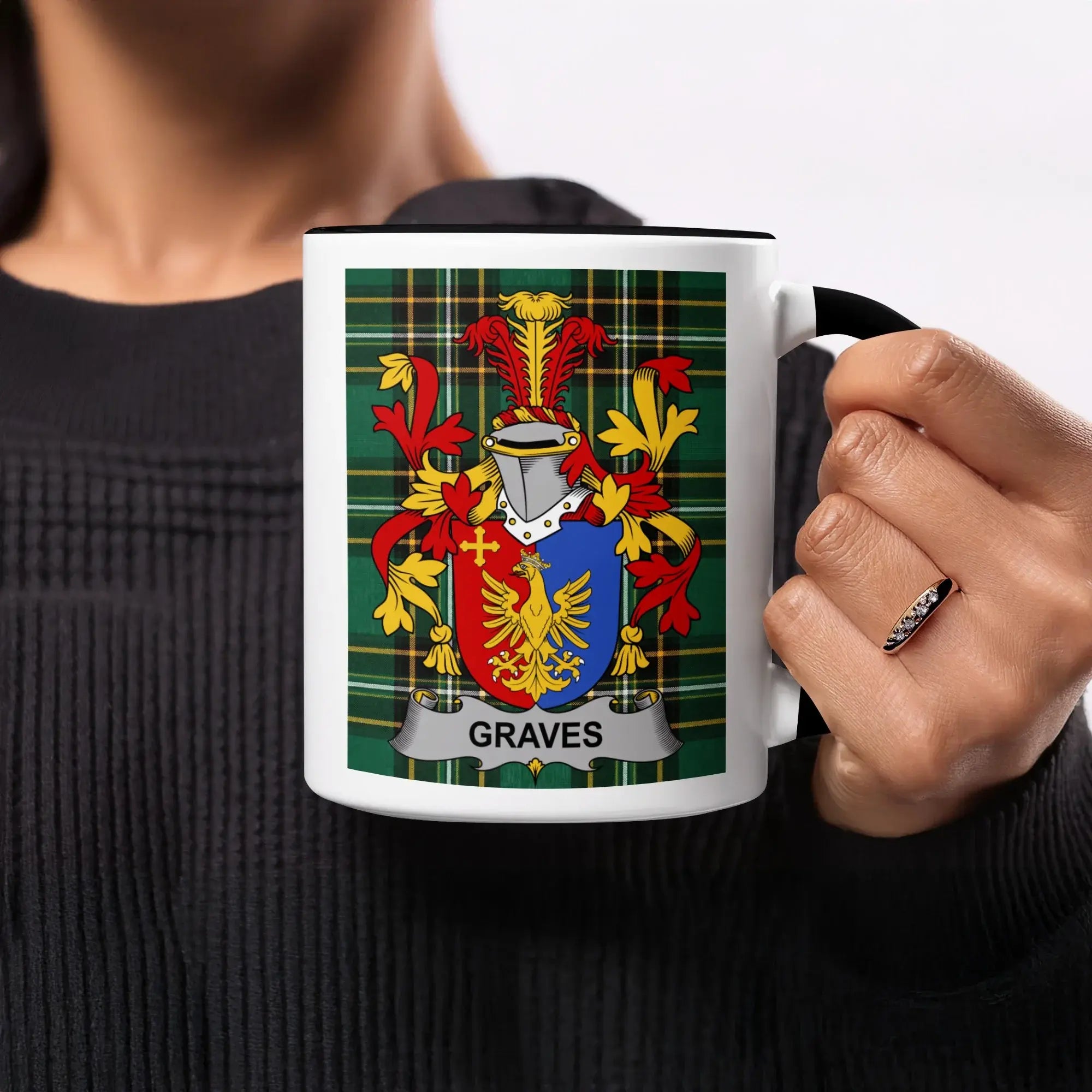 Mug with Graves family crest on plaid background.