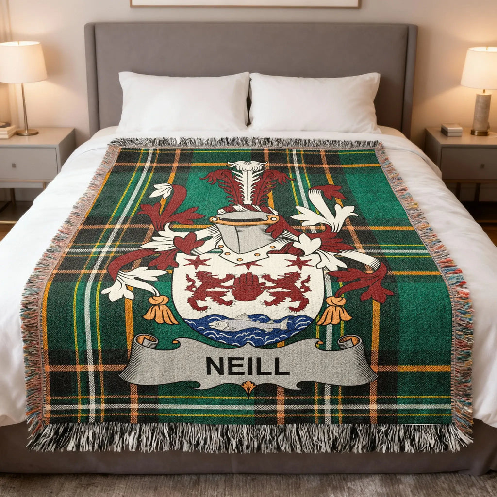Green tartan blanket featuring the Neill family crest with rampant lions.