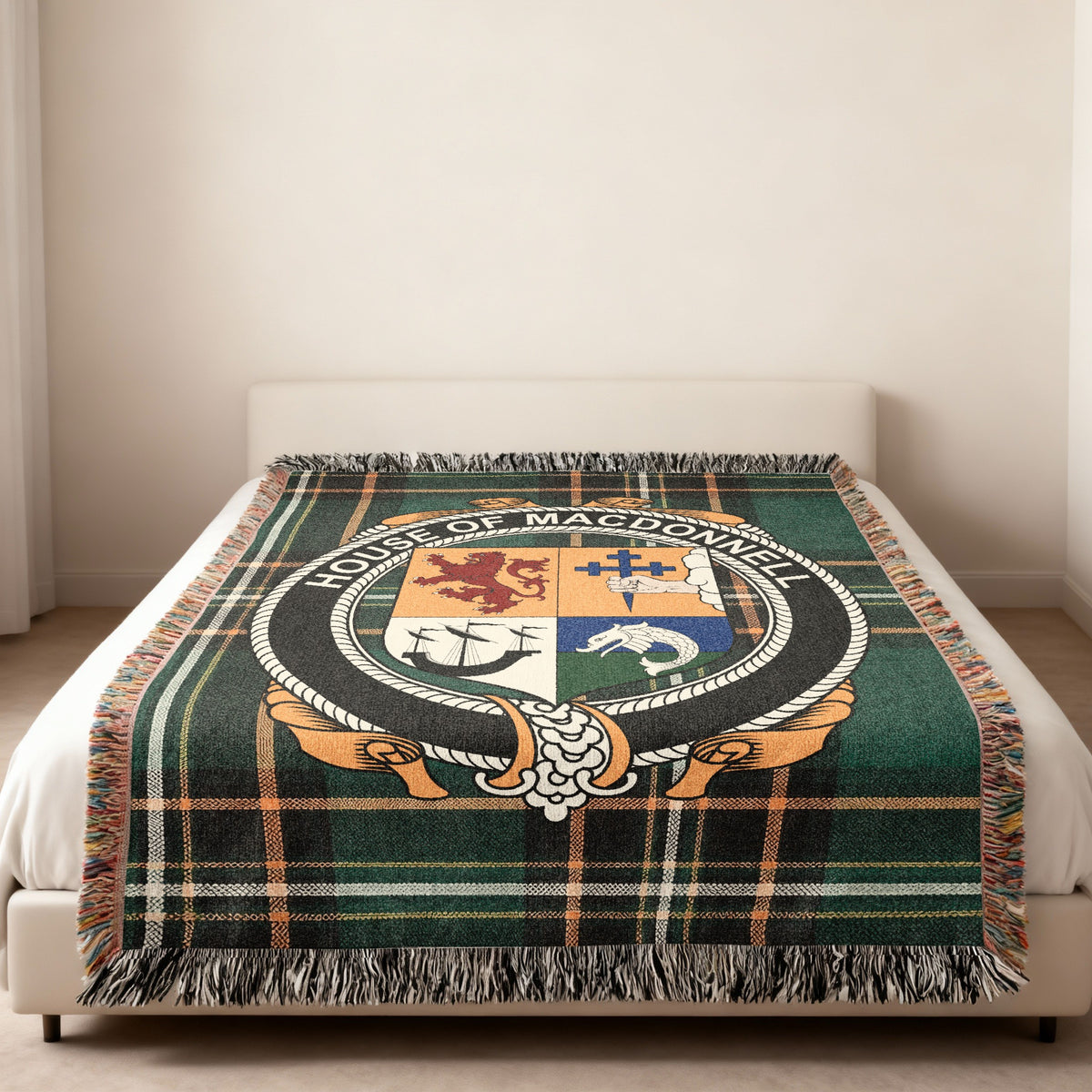 MacDonnell family crest emblem woven blanket displayed on a bed