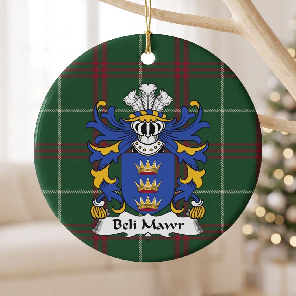 Beli Mawr ornament hanging from a pale wooden branch; three gold crowns on a blue shield on Welsh national tartan.