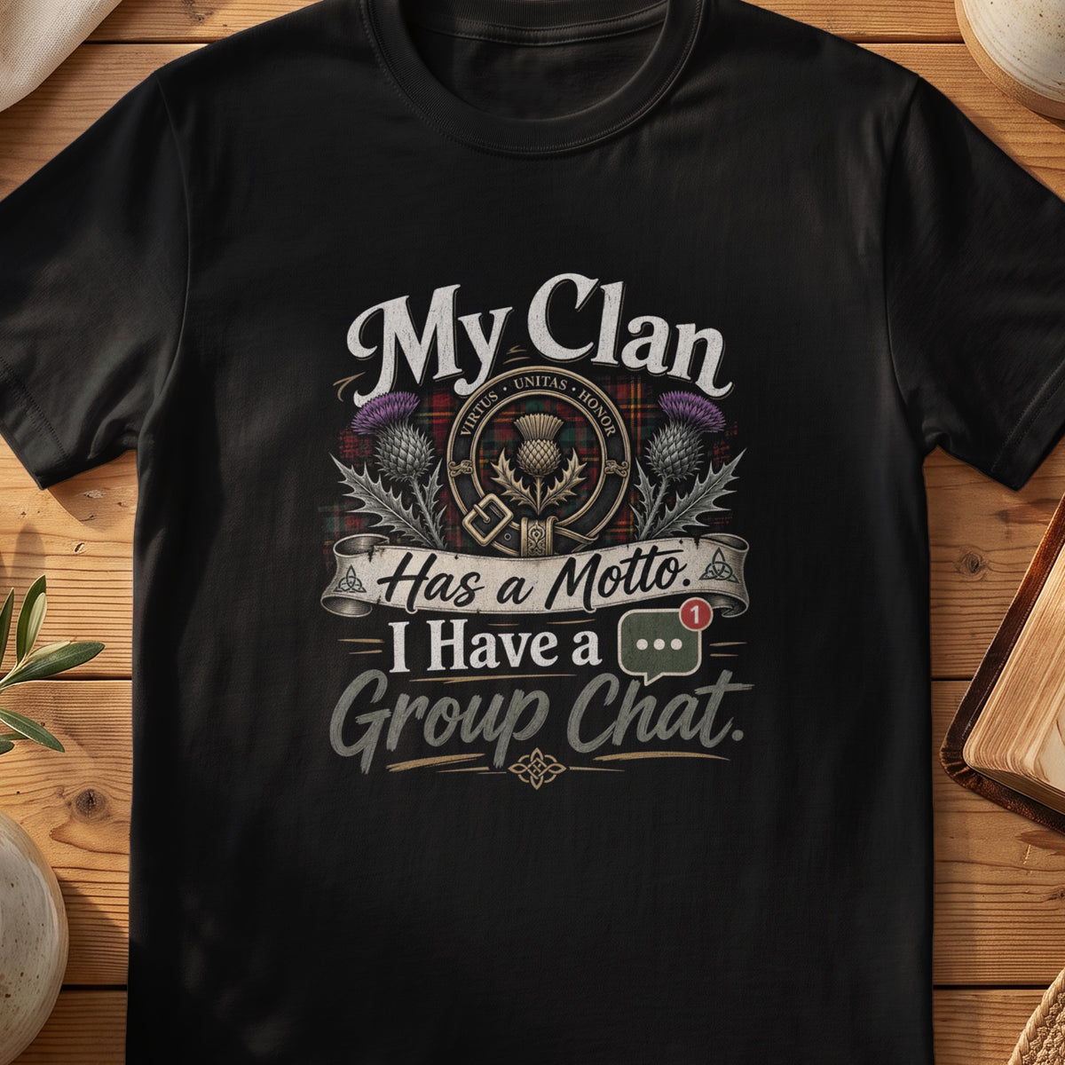 Black Gildan 64000 unisex T-shirt flatlay with My Clan Has a Motto I Have a Group Chat Scottish graphic design