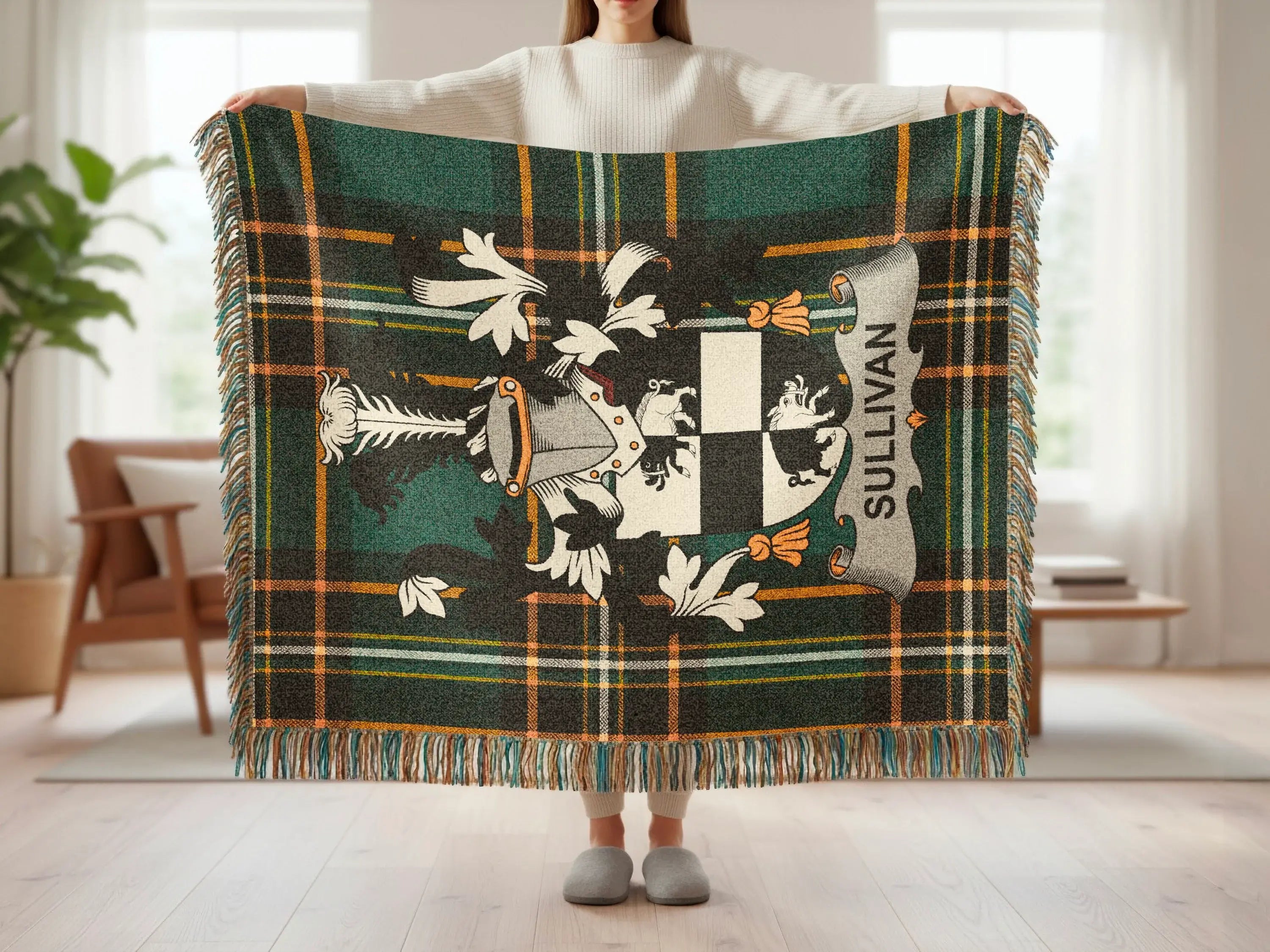 Sullivan family crest on a tartan plaid throw blanket.