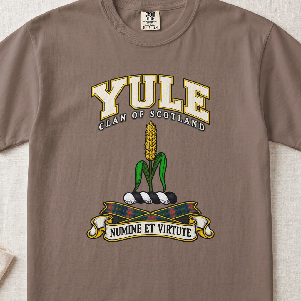 Yule Scottish clan T-shirt in Espresso, front view with a golden ear of grain with green leaves and motto design.