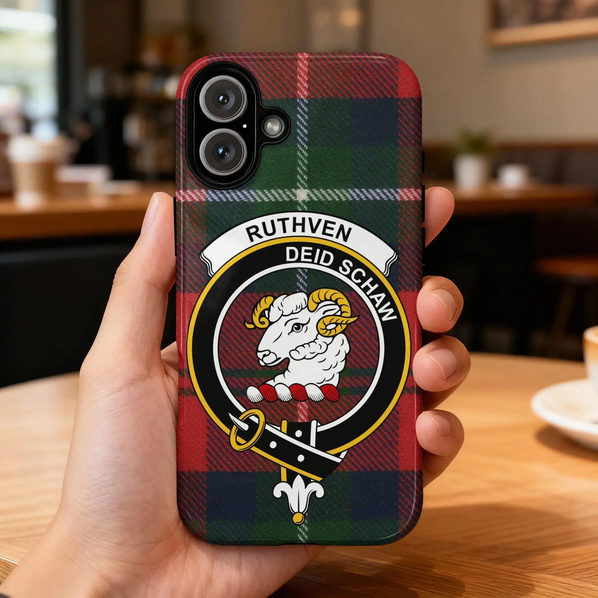 Clan Ruthven tartan phone case — glossy edge-to-edge ram crest print, iPhone shown