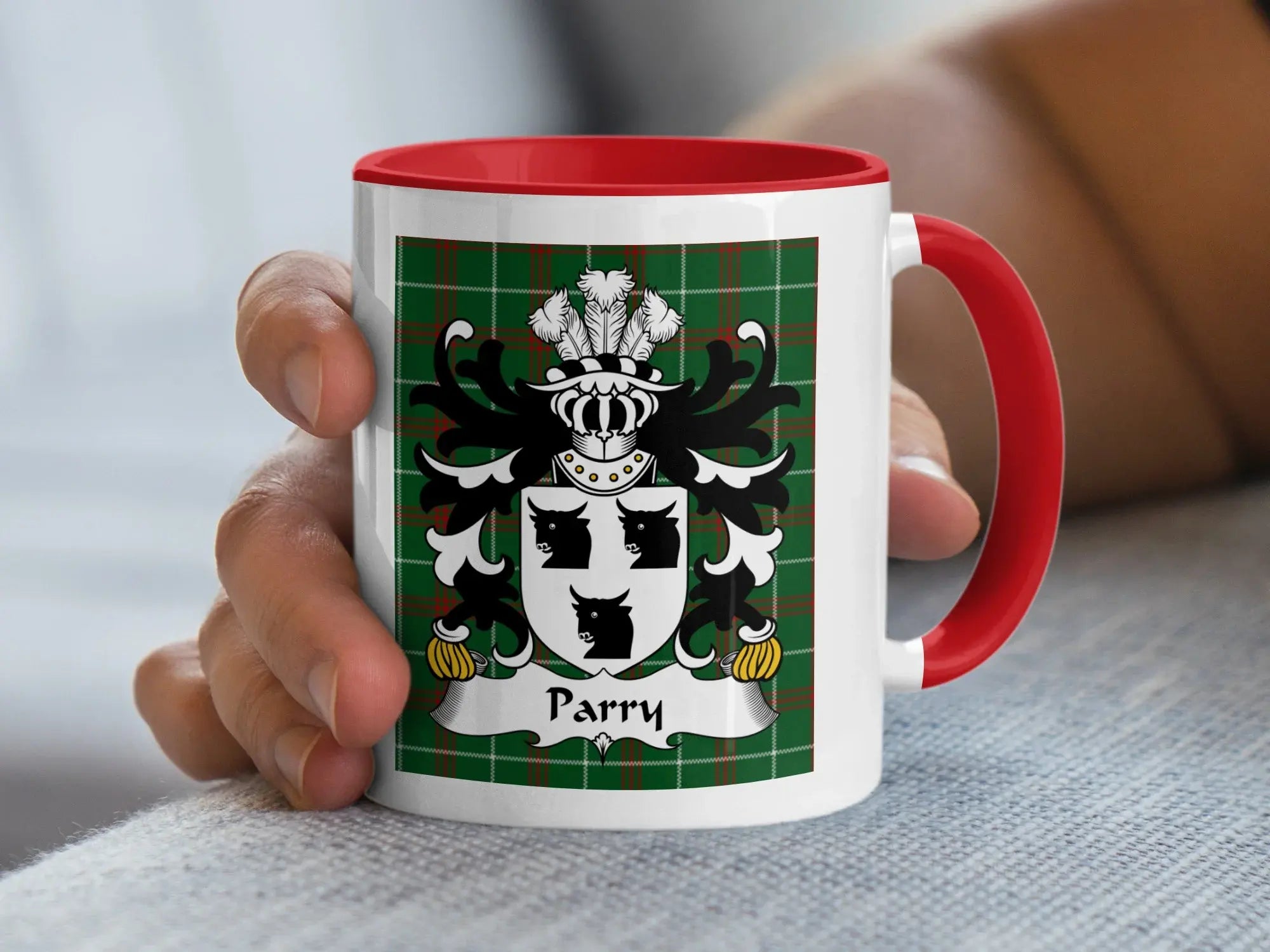 Parry Welsh tartan accent mug with red handle and coat of arms held in hand