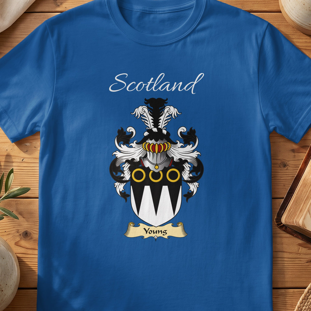 Royal blue Youngs unisex heritage T-shirt with the family shield and surname design.