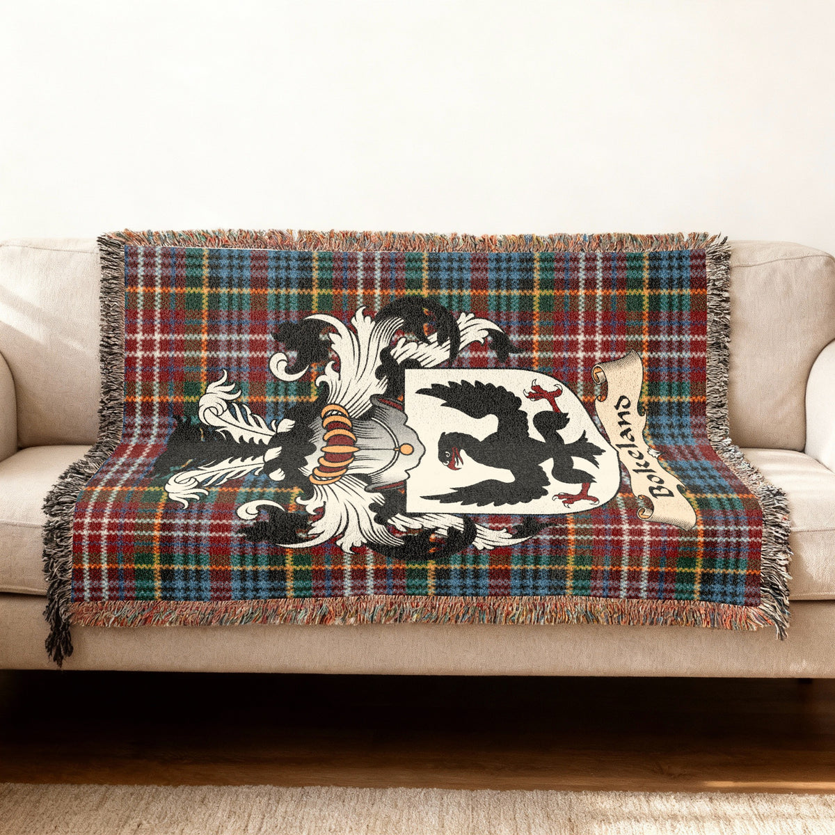 Bokeland Scottish woven blanket with family shield and Caledonia tartan background