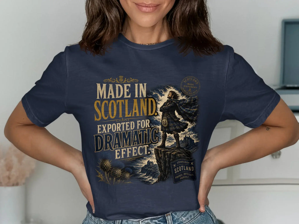 Navy t-shirt with "Made in Scotland, Exported for Dramatic Effect" graphic.